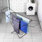 https://static1.b2b.vilde.trade/hpeciai/0eddf60f5b9f2d6898ef9cae1ada0a75/eng_pm_Drying-Rack-Metal-Black-Foldable-181-cm-15518_2.jpg